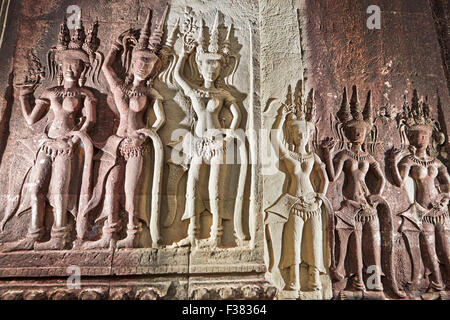 Bas-relief of apsaras (celestial dancers) in Angkor Wat temple. Angkor Archaeological Park, Siem Reap Province, Cambodia. Stock Photo