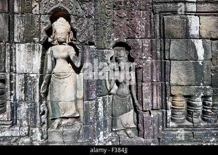 Stone carving on wall in Banteay Kdei temple. Angkor Archaeological Park, Siem Reap Province, Cambodia. Stock Photo