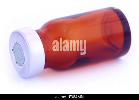 Brown vial over white background