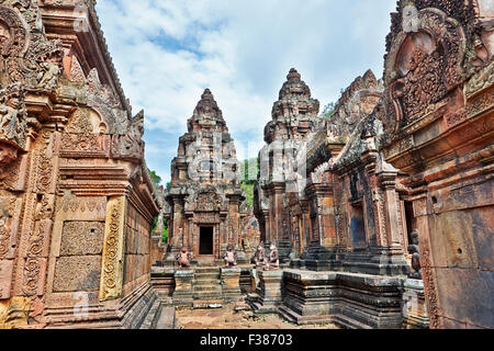 Intricately carved stone buildings at the Banteay Srei temple complex. Angkor Archaeological Park, Siem Reap Province, Cambodia. Stock Photo