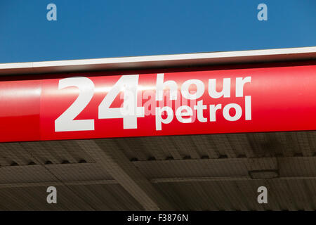 Sign for 24 hour fuel at an Asda Oxford Wheatley supermarket petrol station forecourt outside Oxford, Oxfordshire, UK. Stock Photo