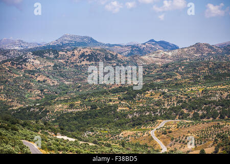 Mediterranean mountain landscape in Greece with olive tree Stock Photo