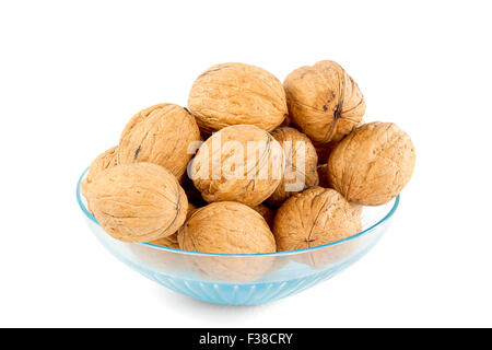walnuts in a bowl isolated on white background Stock Photo