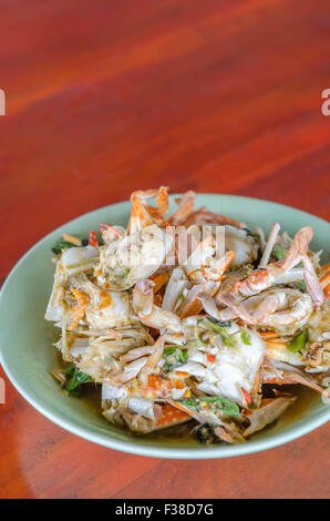 Stir fried Crab with chili & Basil leaves , spicy seafood dish Stock Photo