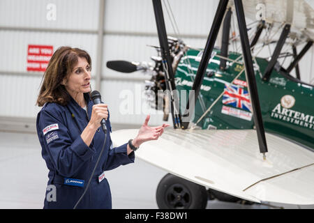 Farnborough Airport, UK. 1st October, 2015. Adventurer Tracey Curtis-Taylor starts 13,000 mile solo biplane flight.  Tracey Curtis-Taylor and Spirit of Artemis Credit:  carol moir/Alamy Live News Stock Photo