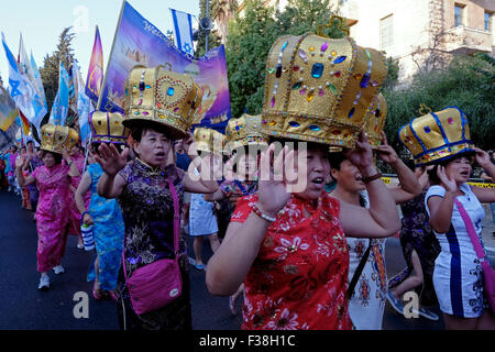 Evangelical Christians from China take part in the annual Jerusalem March during Sukkot feast of the Tabernacles to show their love for the Jewish people and the state of Israel. The parade is hosted by the International Christian Embassy Jerusalem (ICEJ) and draws thousands of Christians from around the world in support of Israel. Stock Photo