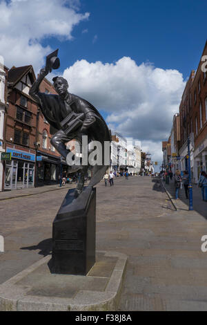 'The Surrey Scholar'. Statue in Guildford High Street was unveiled in 2002. Guildford has a famous old Royal Grammar School high Stock Photo