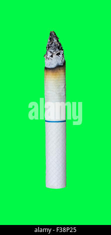 Close up of burning cigarette Isolated on green screen chroma key background. Stock Photo