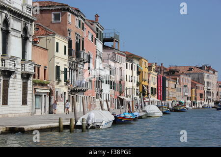 Boats parked on a street in Venice Italy Stock Photo