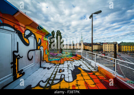 Graffiti on a building and view of Galma Stan, in Slussen, Södermalm, Stockholm, Sweden. Stock Photo