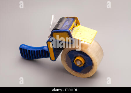 Dispenser isolated on gray background Stock Photo
