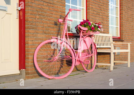 Vintage pink ladies bike Stock Photo