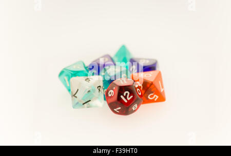 Macro shot of eight multicolored dice on a white background Stock Photo