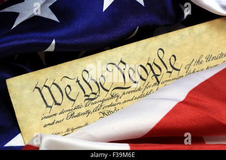 Historical Document US Constitution - We The People with American Flag Stock Photo