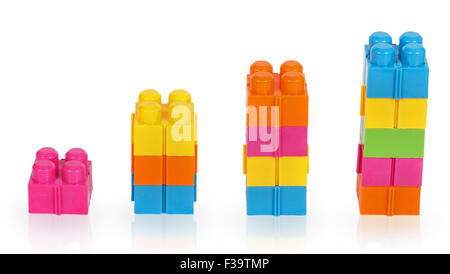 Columns of the elements of the plastic constructor isolated on white background Stock Photo
