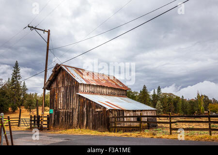 An Old Barn in Mountain Ranch California spared from the flames of the Butte fire Stock Photo