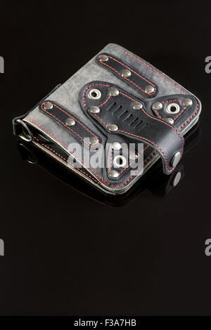 leather wallet on a black background Stock Photo