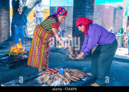 Guatemalan people take part in a traditional Mayan ceremony in Chichicastenango , Guatemala Stock Photo
