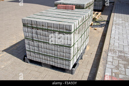 Pallet of concrete grey pavement blocks bricks Stock Photo