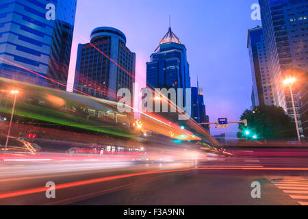 Light trails on a city street at dusk,fuzhou,China Stock Photo