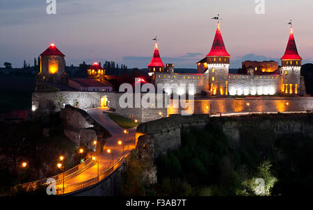 Night panoramic view of medieval half-ruined castle in Kamenetz-Podolsk, Ukraine Stock Photo