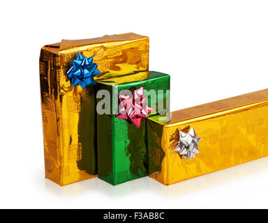 Three colored beautiful boxes with gifts isolated on white background Stock Photo