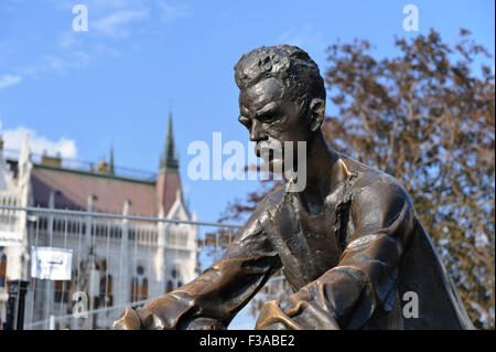 Sculpture of Attila József outside the Hungarian Parliament building in Budapest, Hungary. Stock Photo