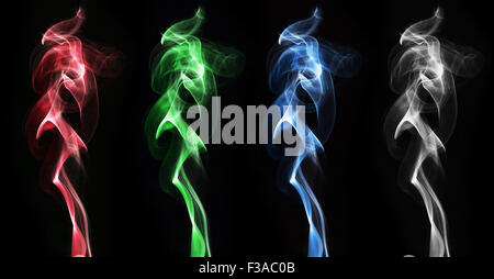 Colorful smoke clouds set on black background Stock Photo