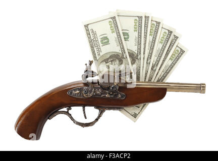 Old gun and hundred dollar bills isolated on white background Stock Photo