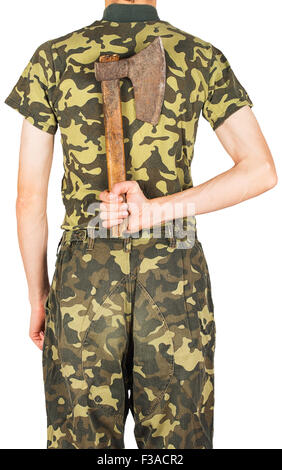 Soldier in uniform with an ax behind his back isolated on white background Stock Photo