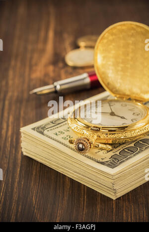 dollars money banknotes on wooden background Stock Photo