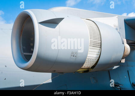 The port inner engine of a McDonnell Douglas/Boeing C-17 Globemaster III configured for reverse thrust Stock Photo