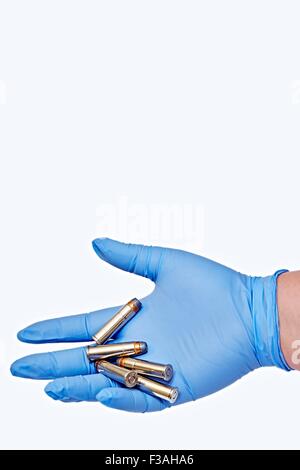 Hand Held 357 Magnum Cartridges Latex Glove 5 Stock Photo