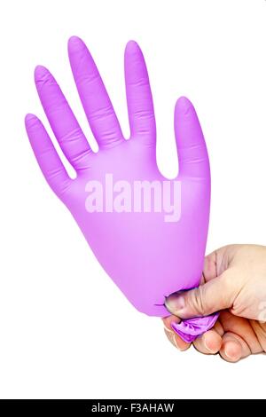 Hand Holding Blown Up Latex Glove Pink Stock Photo