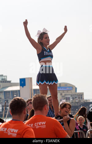 Bournemouth, Dorset, UK. 3 October 2015. Cheerleaders cheer the racers on at Bournemouth Marathon Festival  Credit:  Carolyn Jenkins/Alamy Live News Stock Photo