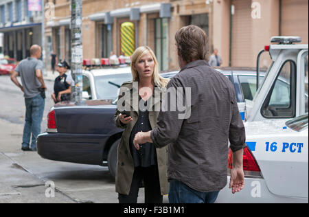 Kelli Giddish and Donal Logue film a scene for Law & Order: SVU in New York City. Stock Photo