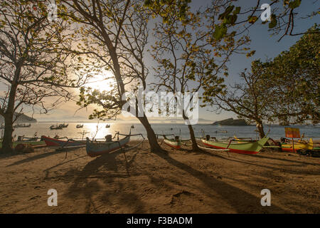 Traditional fisherman boat and landscape view at Papuma Beach, Jember, Indonesia. Stock Photo