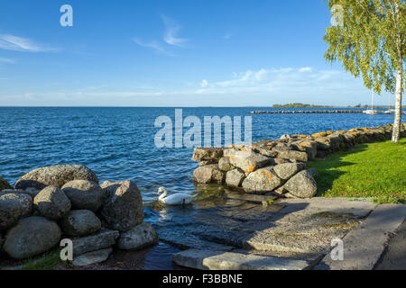 Lake Vättern viewed from Vadstena. The lake is the second largest in Sweden. Vadstena is a historic Swedish town. Stock Photo