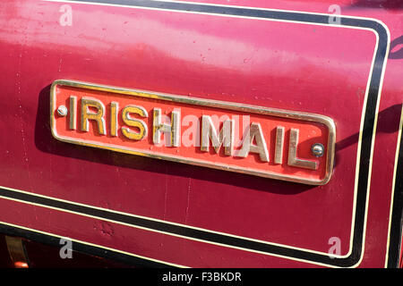 Brass name plate on vintage steam engine Stock Photo