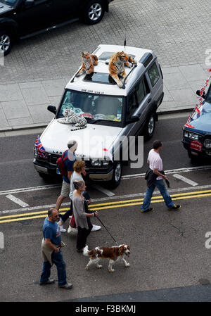 Brighton UK Sunday 4th October 2015 - This vehicle had tigers on its roof as hundreds of Land Rover and Range Rover owners take part in the 17th London to Brighton Land Rover Run which finished on Madeira Drive on the seafront  Credit:  Simon Dack/Alamy Live News Stock Photo