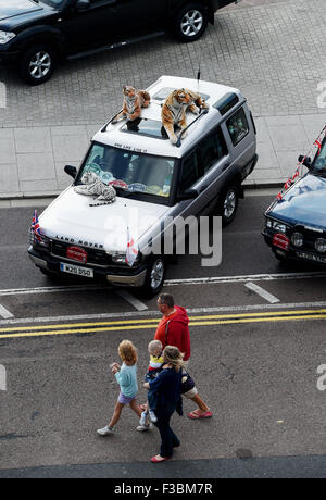 Brighton UK Sunday 4th October 2015 - This vehicle had tigers on its roof as hundreds of Land Rover and Range Rover owners take part in the 17th London to Brighton Land Rover Run which finished on Madeira Drive on the seafront  Credit:  Simon Dack/Alamy Live News Stock Photo