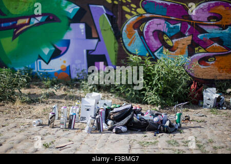 Spray cans and other artistic materials ready to be used creating street art in London's east end. Stock Photo