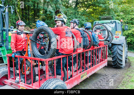 Rostrevor, Northern Ireland. 04 Oct 2015 - Cyclists are bussed to the starting point in a trailer pulled by a tractor. Credit:  Stephen Barnes/Alamy Live News. Stock Photo