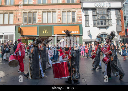 Leicester, UK. 4th October, 2015. Street Carnival Samba Dancers performing in Leicester City  centre as part of the celebrations before the Rugby World cup match between Argentina and Tonga being played at Leicester city football ground Credit:  David Holbrook/Alamy Live News Stock Photo