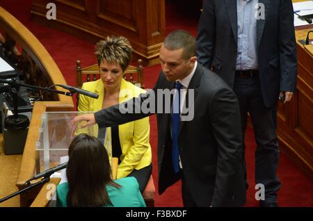 Athens, Greece. 04th Oct, 2015. MP with olden Dawn Ilias Kassidiaris casts his vote. Greek Legislators vote in the Greek Parliament for the new president of the Greek Parliament. The only candidate Nikos Voutsis was elected with 181 votes. © George Panagakis/Pacific Press/Alamy Live News Stock Photo