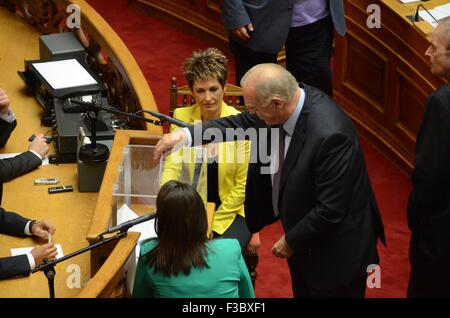 Athens, Greece. 04th Oct, 2015. President of the Union of Centrists Vassillis Leventis casts hos vote. Greek Legislators vote in the Greek Parliament for the new president of the Greek Parliament. The only candidate Nikos Voutsis was elected with 181 votes. © George Panagakis/Pacific Press/Alamy Live News Stock Photo