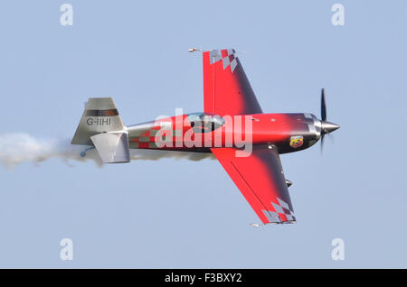 Extra 330SC aerobatic aircraft displaying at the Airshow Season Finale, Shuttleworth Collection, Old Warden, Bedfordshire, UK. 4th October 2014. Credit:  Antony Nettle/Alamy Live News Stock Photo