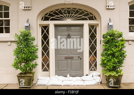 Charleston, South Carolina, USA. 4th October, 2015. Sandbags protect the door of a historic home as Hurricane Joaquin brings heavy rain, flooding and strong winds as it passes offshore October 4, 2015 in Charleston, South Carolina. Stock Photo