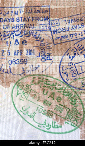 Visa stamps exit and entry - immigration arrival stamps on Greek passport Stock Photo
