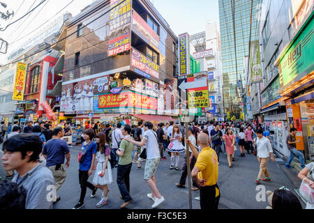 Busy street in Akihabara known as Electric Town or Geek Town selling Manga based games and videos in Tokyo Japan Stock Photo